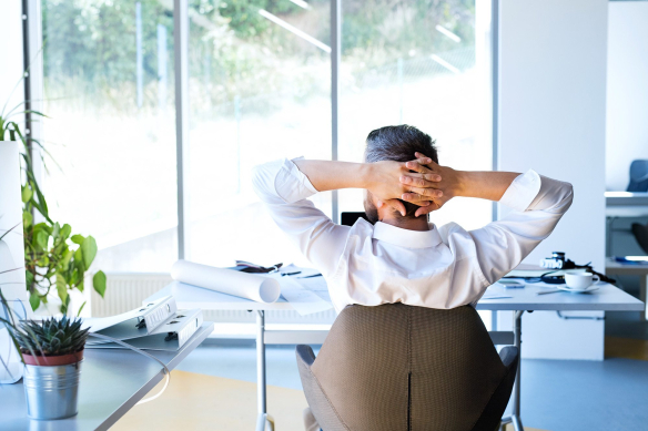demo-attachment-31-Businessman-at-the-desk-in-his-office-resting.