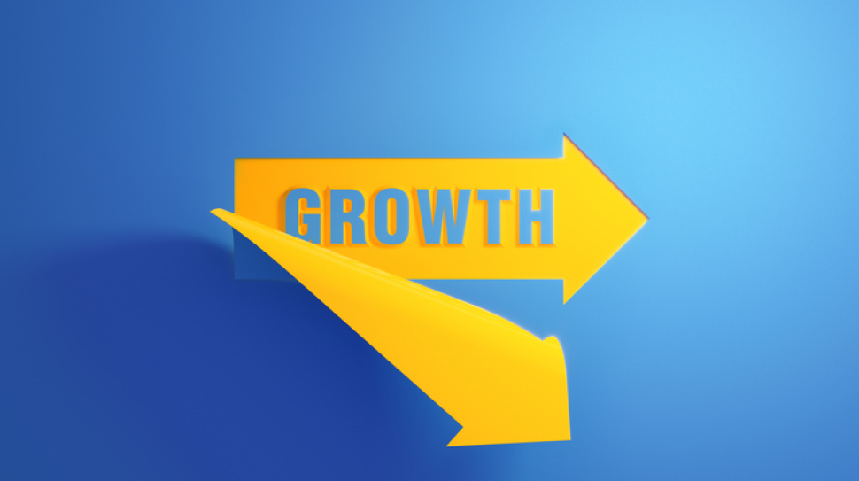 Yellow arrow symbol on blue background.  Growth writes inside of the arrow symbol. Horizontal composition with copy space.